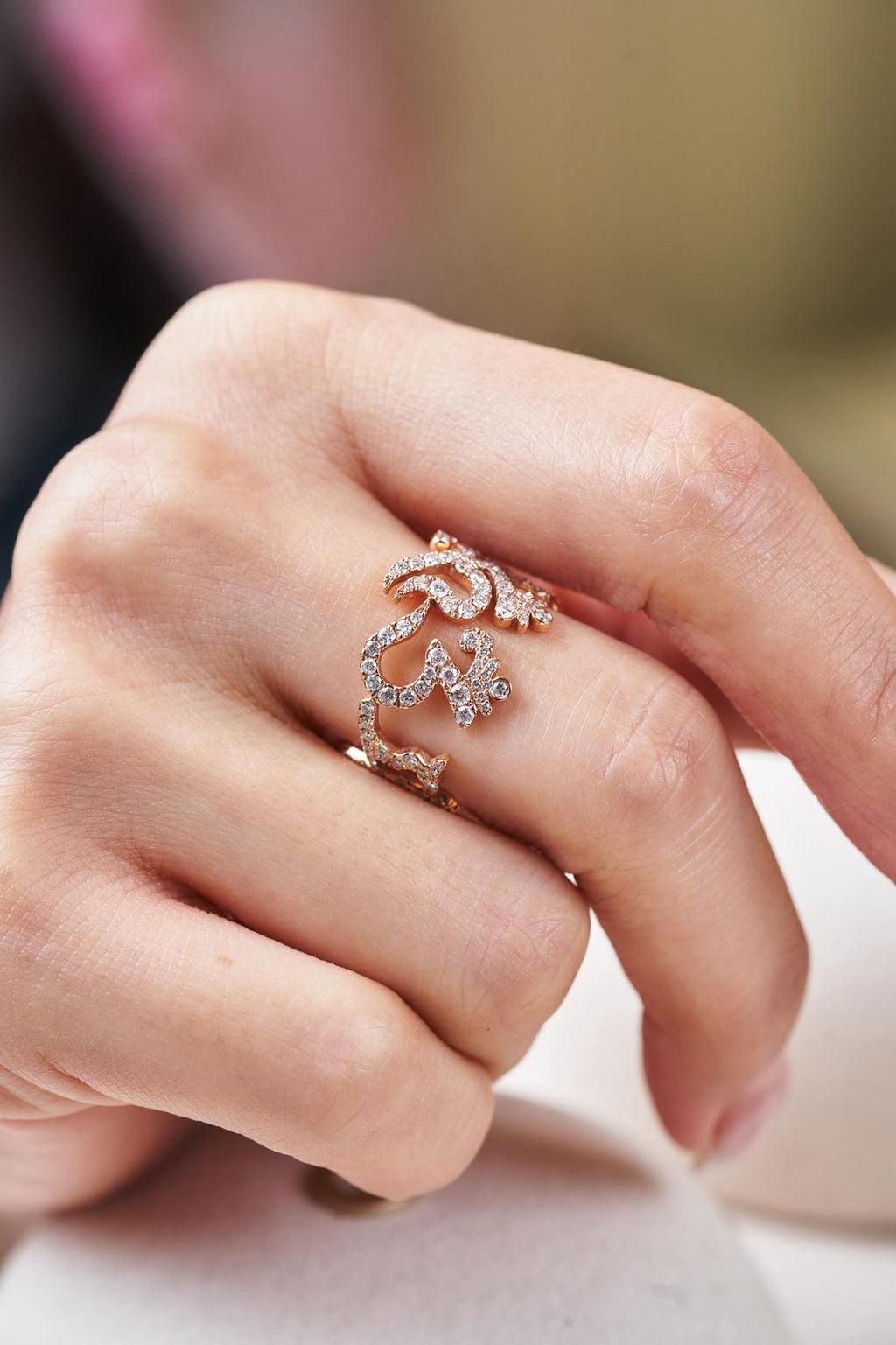 The six -Character Great Bright  Mantra" (Om Mani Padme Hum) diamond ring