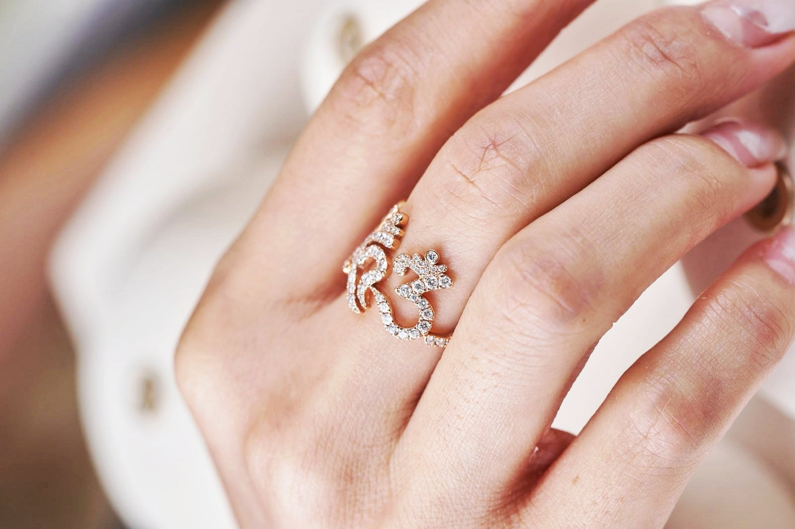 The six -Character Great Bright  Mantra" (Om Mani Padme Hum) diamond ring